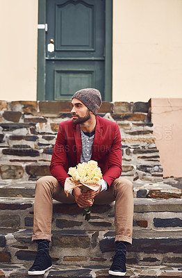 Buy stock photo Flowers, fashion and man on stairs in city outdoor for vacation, adventure or holiday. Style, steps and person with floral plant and cool, trendy and stylish outfit for winter weekend trip in town.