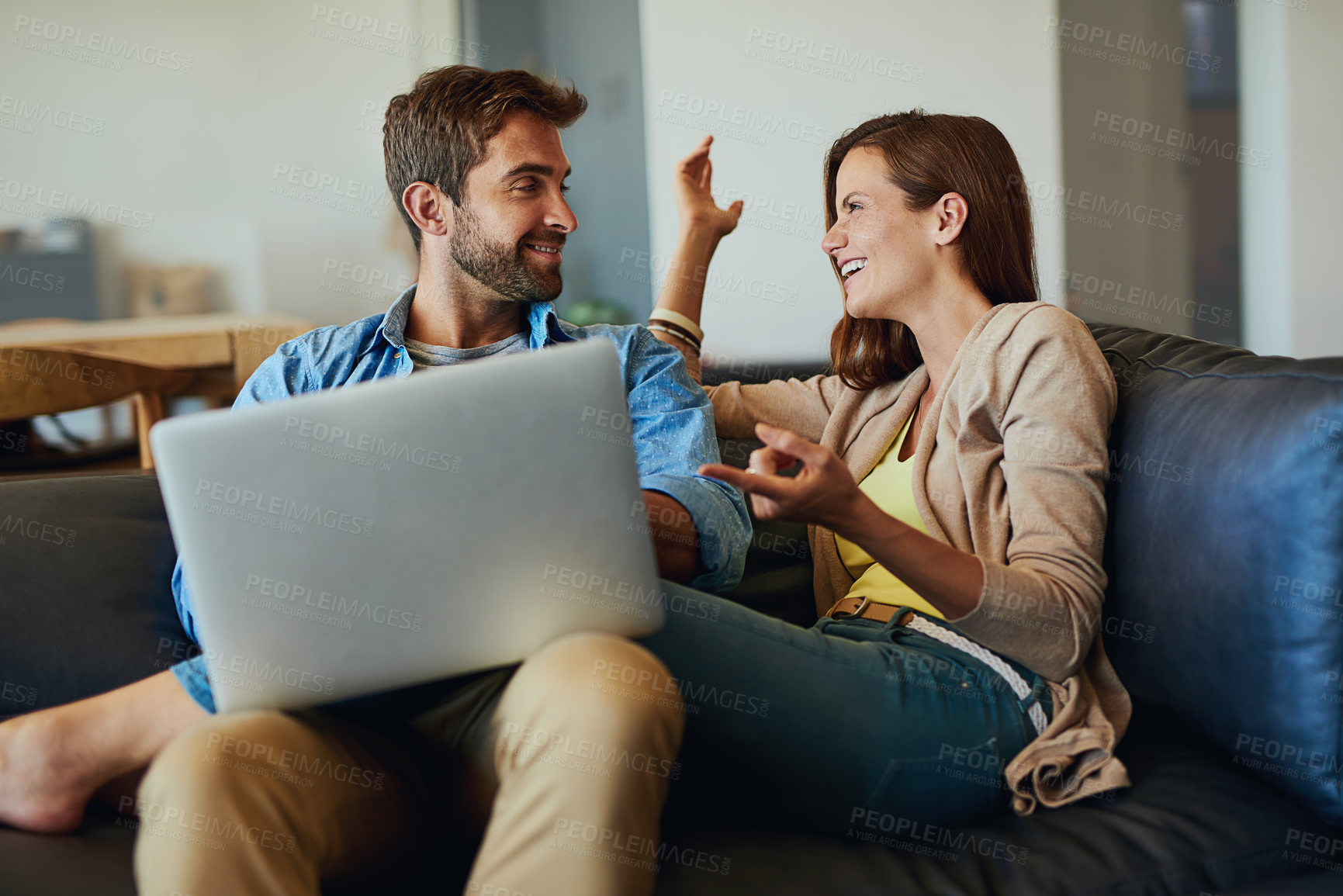 Buy stock photo Couple, laptop and laughing on sofa in home with social media scroll, conversation or watching movie with bonding. People, technology or happy on couch in lounge with online streaming and discussion