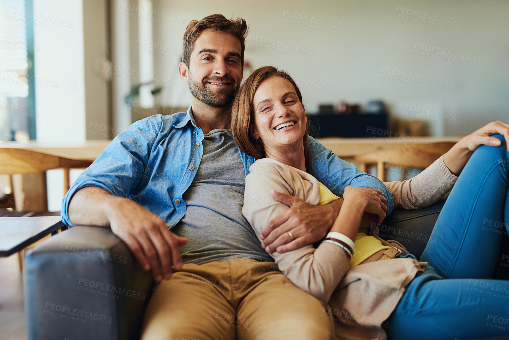 Buy stock photo Portrait, home and couple with happiness, hug and break with romance, relax and relationship. Face, apartment and man with woman, marriage and commitment with embrace, time together or love in lounge