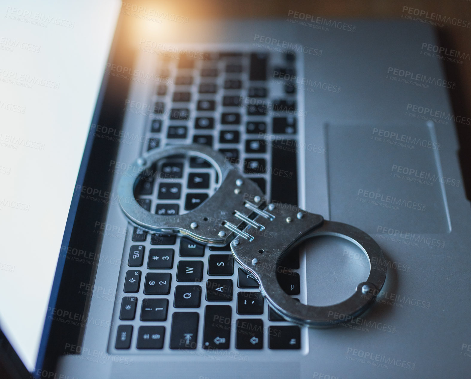 Buy stock photo Laptop, handcuffs and hacking crime at night for investigation of illegal, arrest or law enforcement of data protection. Digital, security and criminal danger for surveillance of cyber attack risk
