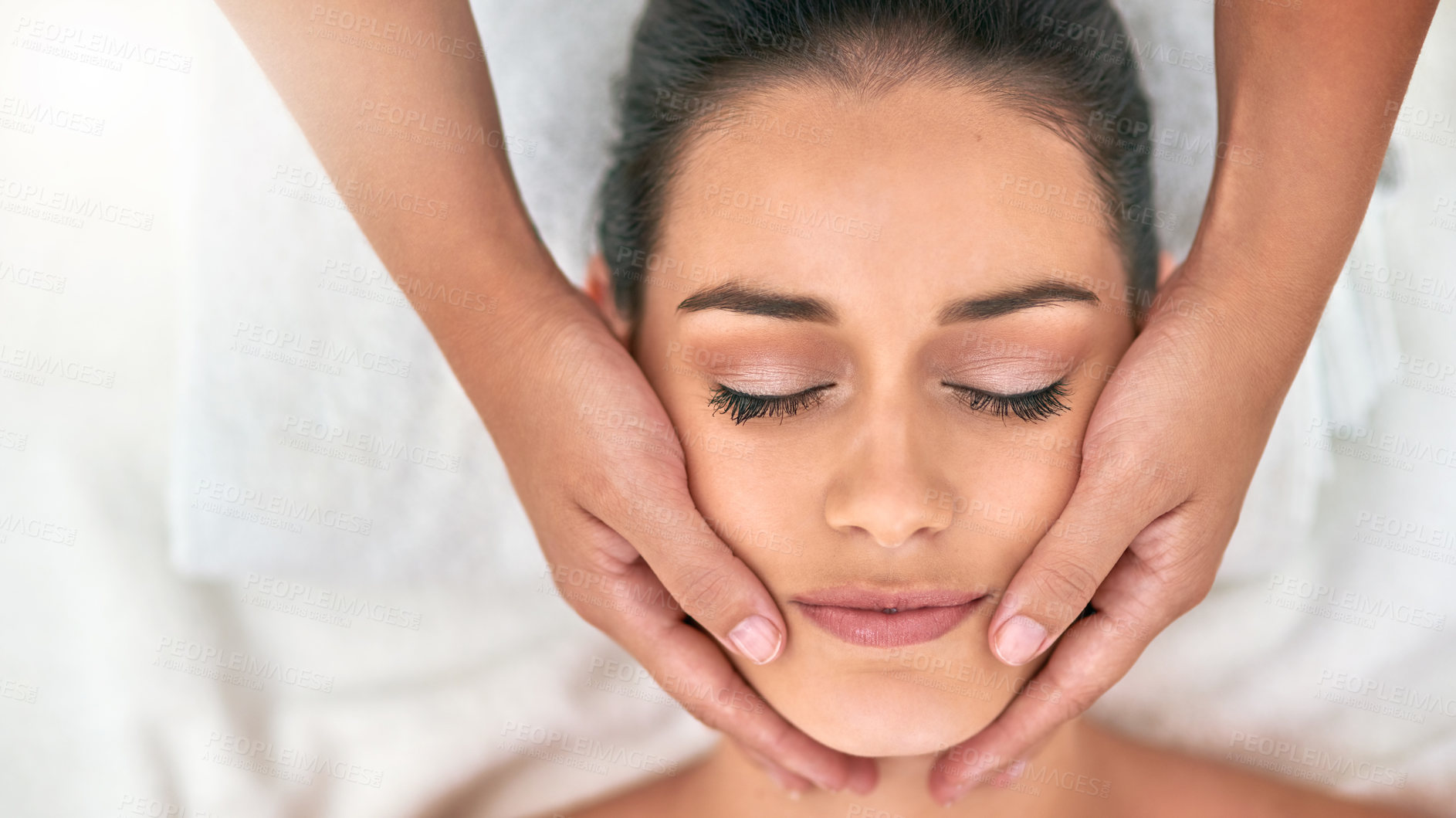 Buy stock photo Face, hands for massage and woman in beauty spa with masseuse to relax for health, peace or wellness. Calm, stress relief or wellbeing with client and therapist in salon for treatment from above