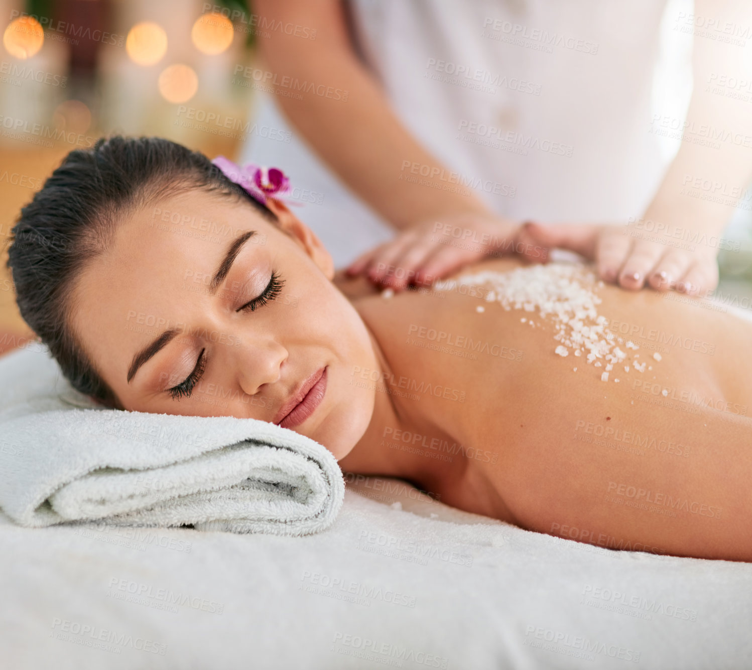 Buy stock photo Scrub, spa and portrait of woman with back massage for relax, calm and self care weekend at resort. Salt, pamper and female person with body treatment for tranquility at wellness retreat in Thailand.