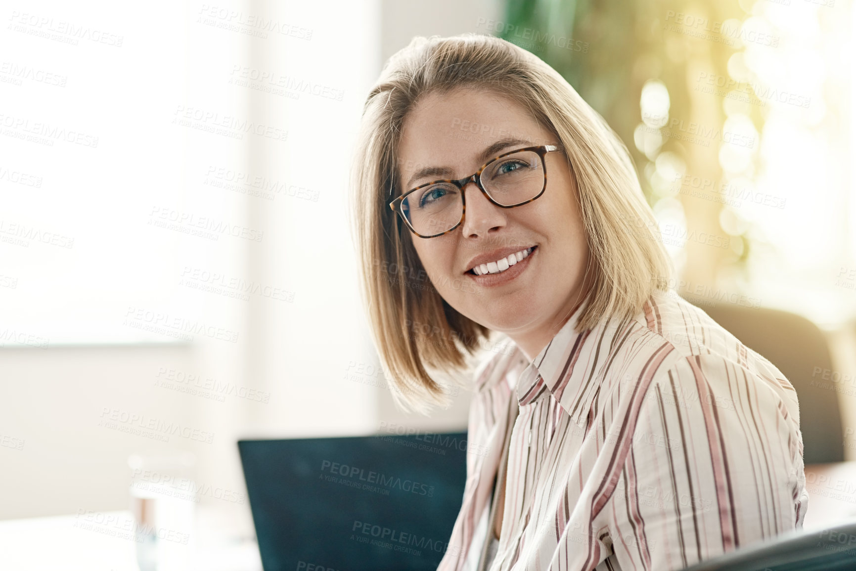 Buy stock photo Portrait of a confident businesswoman working in an office