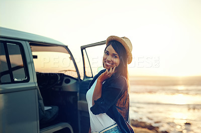 Buy stock photo Shot of a young woman enjoying a relaxing roadtrip