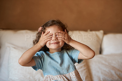 Buy stock photo Playing, cute and child with hide and seek in home for learning, counting or fun in bedroom. Sweet, happy and girl kid with hands on face for game with cognitive growth and development at house.