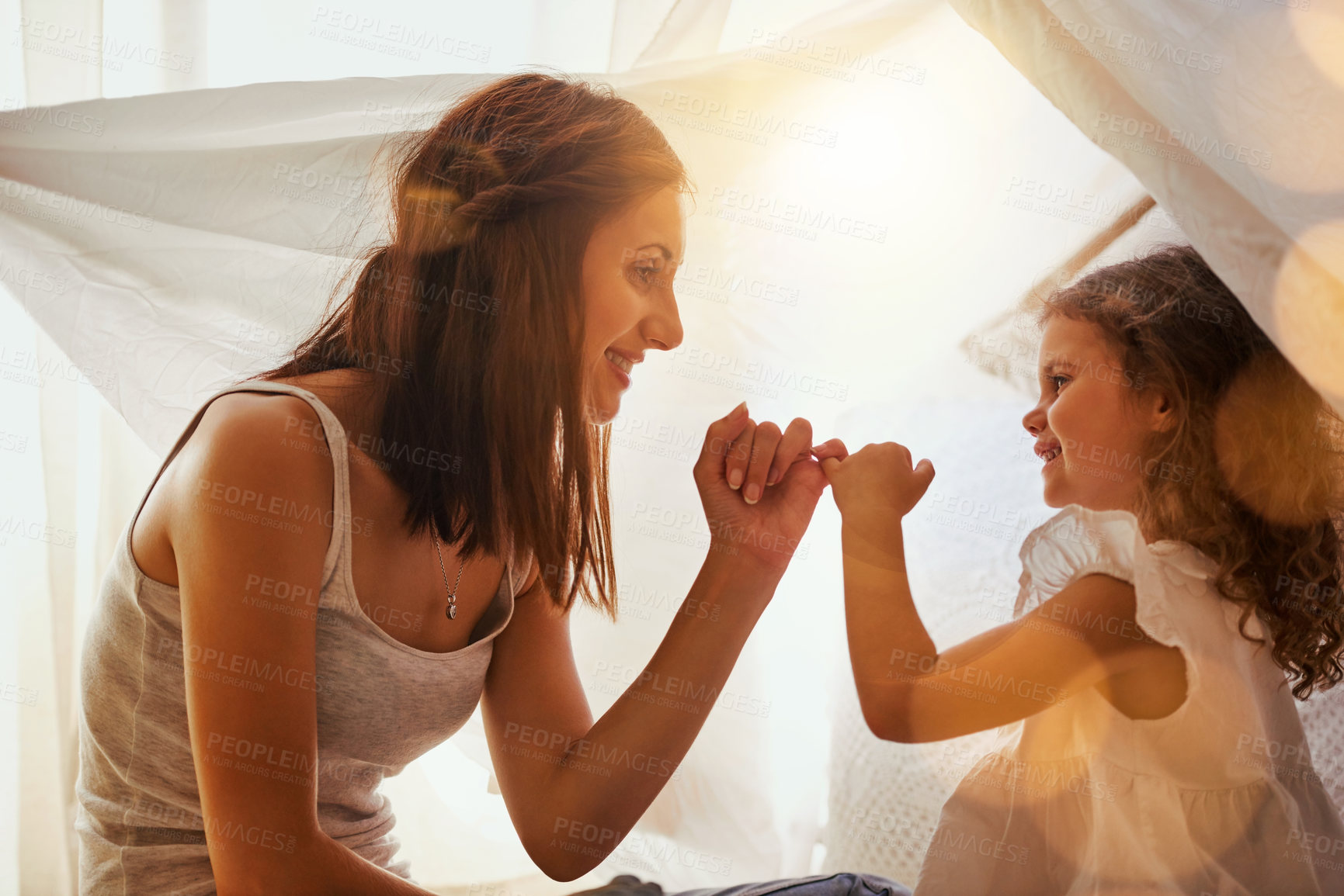 Buy stock photo Pinky promise, home and mom with child in bedroom with trust for secret, agreement and honesty. Family, love and mother and girl with hand gesture in tent for confidential, bonding and relationship