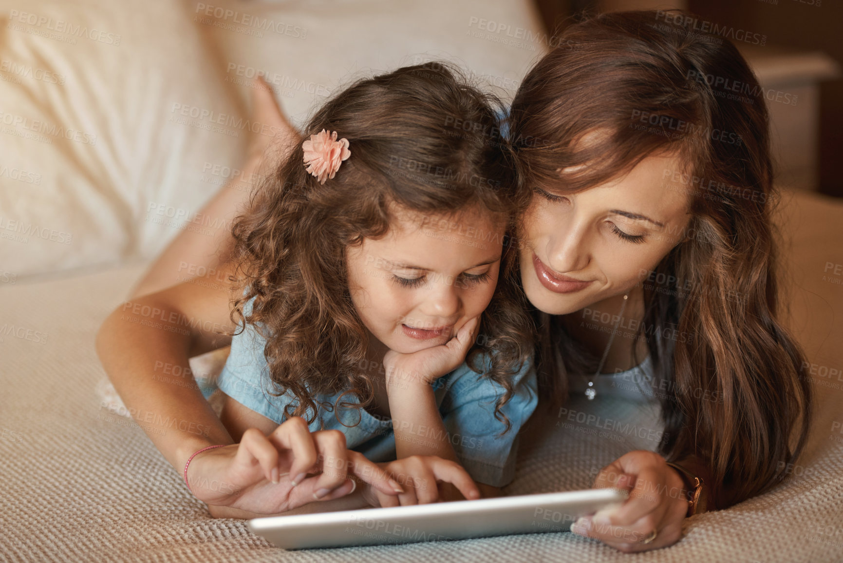 Buy stock photo Bed, mom and child with tablet, games and bonding with learning, education and love in home. Digital app, woman and daughter together in bedroom for online streaming subscription, movies and relax