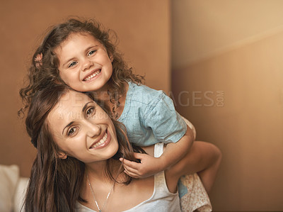 Buy stock photo Piggy back, portrait and mom with child in bedroom for bonding, loving relationship and relax in home. Family, happy and mother with young girl for embrace together for love, support and trust