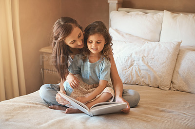 Buy stock photo Bed, mom and child with book, reading and bonding for fun, education and love in home. Story, woman and girl together in bedroom for storytelling, learning and relax with care, growth and development