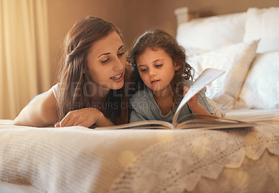 Buy stock photo Home, reading and mom and child with book for story time, education and learning in bedroom. Relax, family and mother and young girl with novel for fantasy, storytelling and literature for bonding