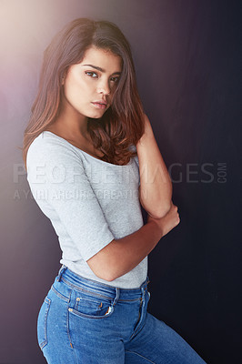 Buy stock photo Portrait, fashion and young woman with gen z, trendy and student style in studio with confidence. Modern, casual and comfy outfit with girl from Italy with minimalist clothes and black background 