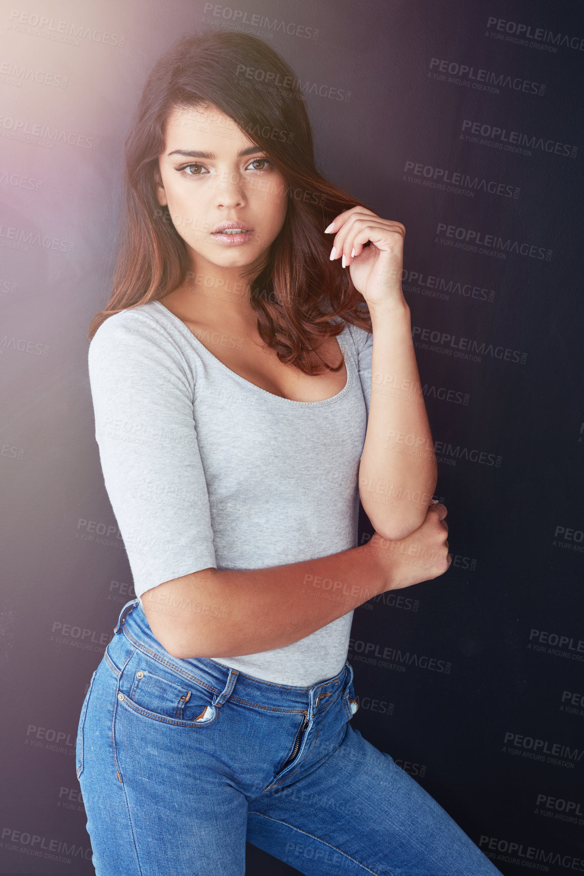 Buy stock photo Portrait, fashion and young woman with gen z, jean and student style in studio with confidence. Modern, casual and comfortable outfit with teen from Italy with minimalist clothes and wall background 