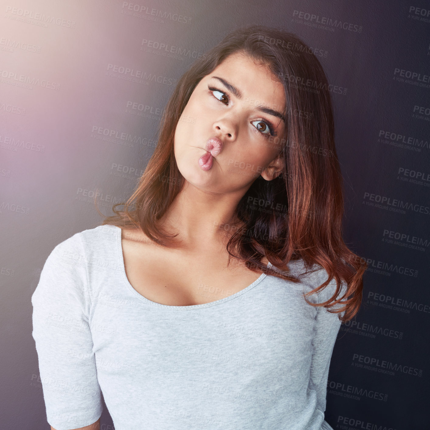 Buy stock photo Portrait, fish face and woman with funny, comedy and crazy emoji for prank on dark background. Silly, playful or quirky student in studio with joke and goofy expression of happy teenager with humor