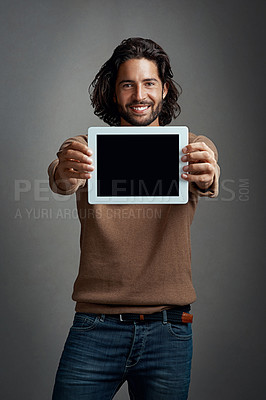 Buy stock photo Portrait, tablet screen and happy man with mockup in studio isolated on a gray background. Touchscreen, face and male person with marketing, advertising and technology for commercial promotion space.