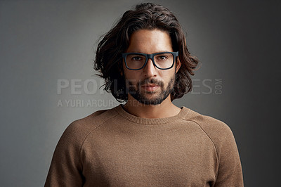 Buy stock photo Portrait, glasses and serious man in studio isolated on a gray background. Face, nerd and handsome male person from Australia with spectacles, eyewear or frames for fashion, stylish and aesthetic.