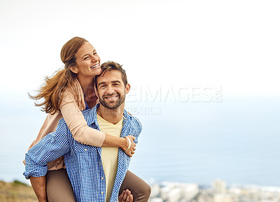 Buy stock photo Couple, piggy back and smile for love, outdoors and vacation or holiday, date and bonding in nature. Happy people, play and fun on trip, travel and connection in marriage, support and trust or face