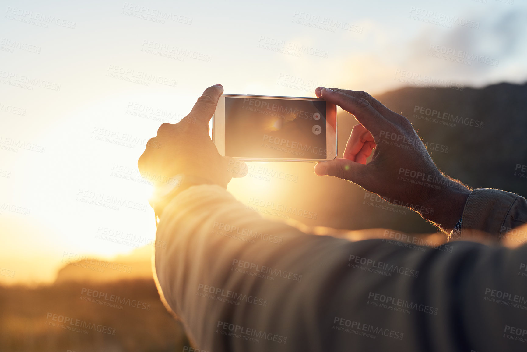 Buy stock photo Sunset, phone and hand of person with picture for travel blog, update and memory of holiday. Sky, nature and screen of technology with photography in evening for social media, post and adventure