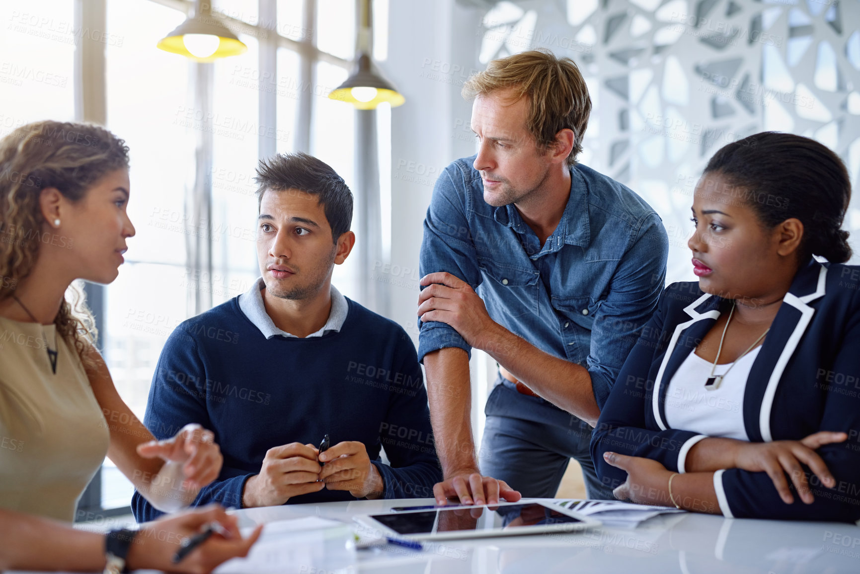 Buy stock photo Shot of a team of businesspeople working together in the office