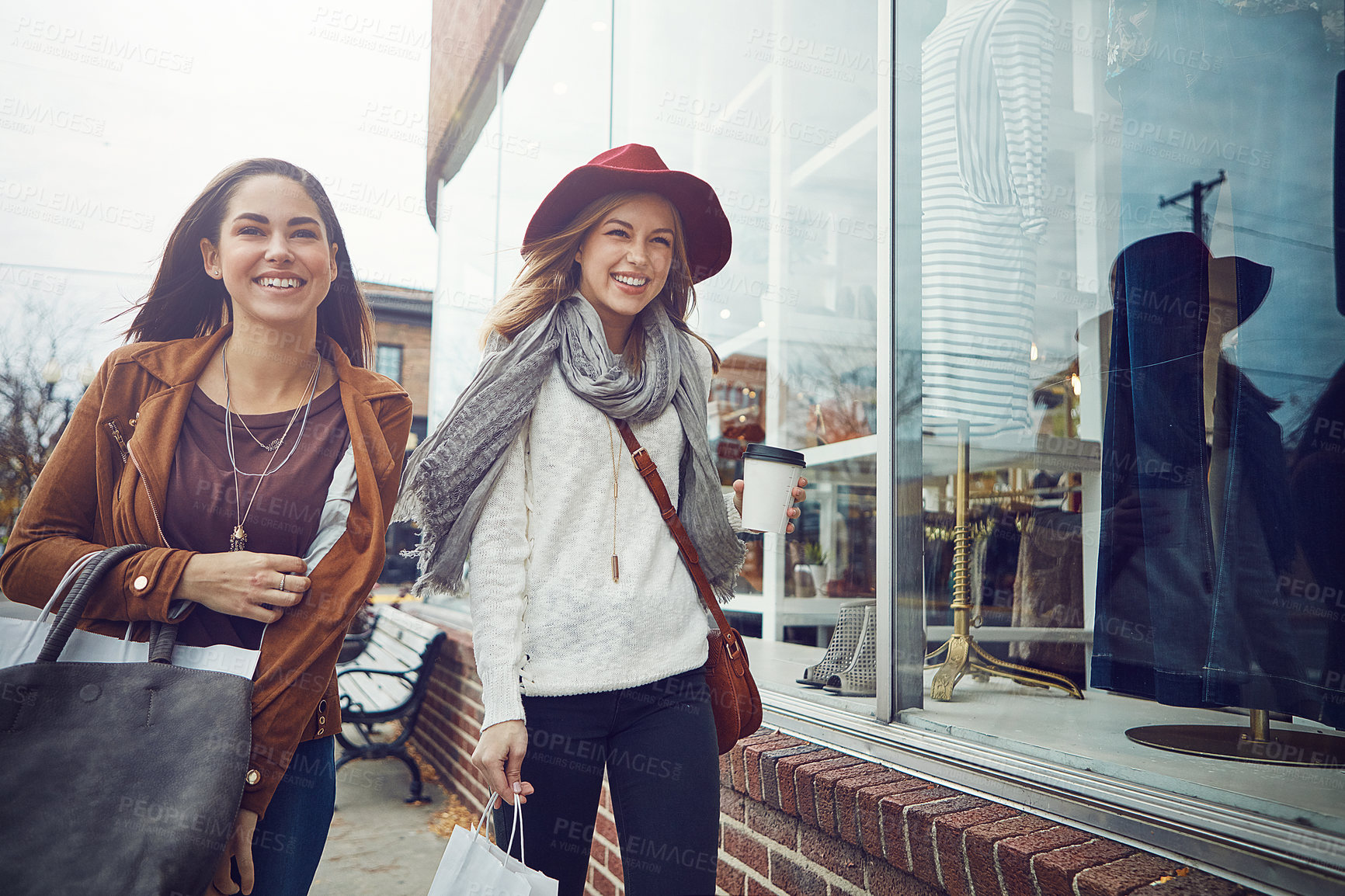 Buy stock photo Shot of two young women out on a shopping spree