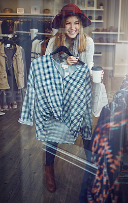 Buy stock photo Customer, woman and happy with blouse in boutique store for promotion, discount and sale. Smile, female buyer and person checking rack of clothes in fabric, retail shop at indoor mall and window