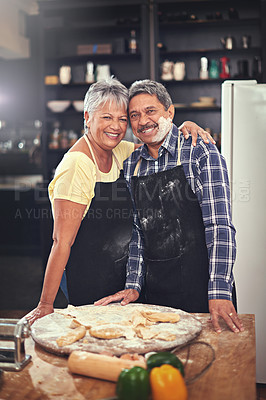 Buy stock photo Cooking, smile and portrait of senior couple in kitchen at home with dough, flour and ingredients for meal. Happy, food and elderly man and woman preparing dinner, lunch or supper together at house.