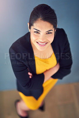 Buy stock photo Studio, lawyer and face of woman, proud and professional with top view, legal and confidence. Blue background, student and smile of person, internship and career in law firm for financial advisor