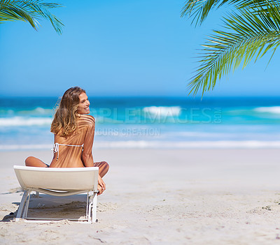 Buy stock photo Tropical, relax and woman at the beach for holiday, travel and summer by the ocean in Bali. Nature, happy and girl on a chair by the sea for an island vacation in a bikini with a smile by the water