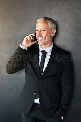 Buy stock photo Happy businessman, phone call and thinking with communication, contact and network in studio. A senior entrepreneur person on a grey background with a smartphone for conversation and connection