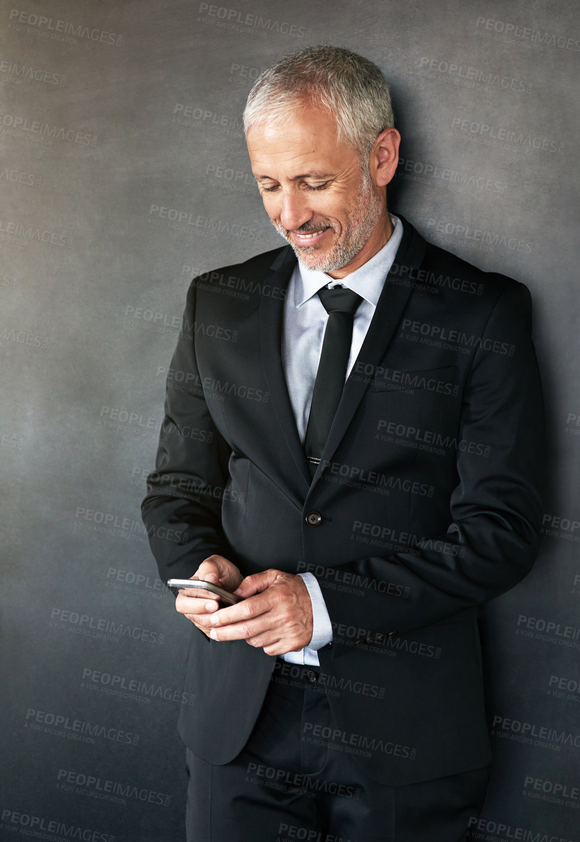 Buy stock photo Cropped shot of a handsome mature businessman in corporate attire