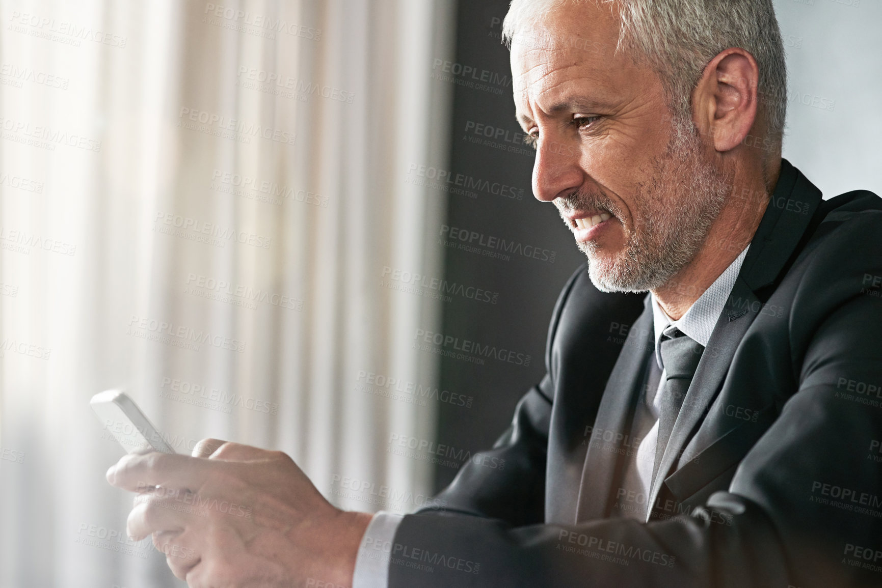 Buy stock photo Cropped shot of a handsome mature businessman in corporate attire