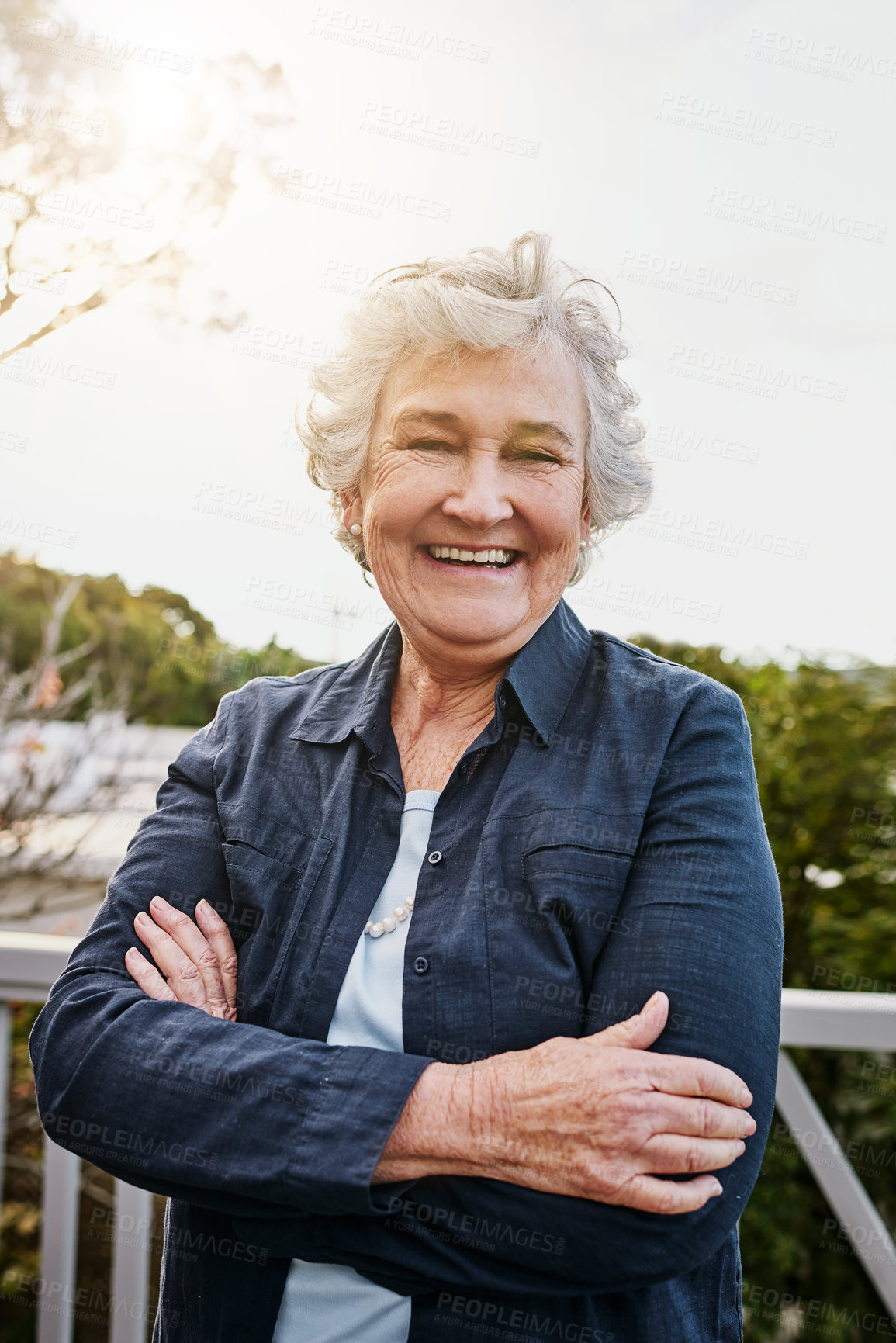 Buy stock photo Portrait of a happy and confident senior woman standing outside