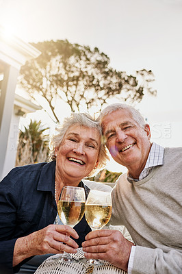 Buy stock photo Love, cheers and wine, portrait old couple celebrate romantic anniversary date on patio of vacation home. Champagne, senior man and happy woman with toast, happiness and romance on holiday with smile