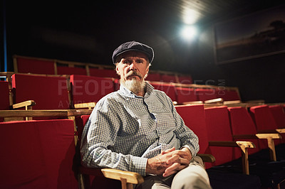 Buy stock photo Senior man, portrait and chair at cinema for movie, performance and concert in theater. Elderly person, retired producer and relaxed in auditorium for production, creativity and waiting for show