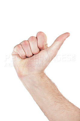 Buy stock photo Sign language, hand and thumb pointing in a studio for direction, communication or counting. Finger, body language and man with a hand gesture isolated by a white background with mockup space.