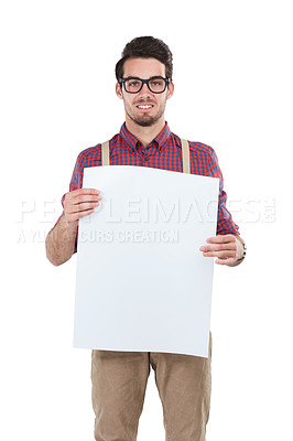 Buy stock photo Paper, poster and portrait of man in studio for advertising, billboard and space on white background. Face, banner and mockup by handsome, smile and happy male with placard, display and isolated