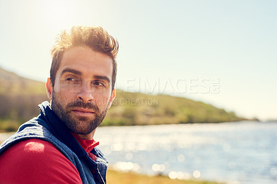 Buy stock photo Man, thinking and relax by lake in nature for scenery, sightseeing or travel location with space. Person, face and thoughtful with daydreaming, wondering or view with tourism for fresh air on holiday