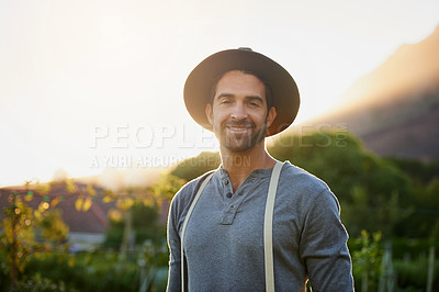 Buy stock photo Portrait of a happy young man working on a farm