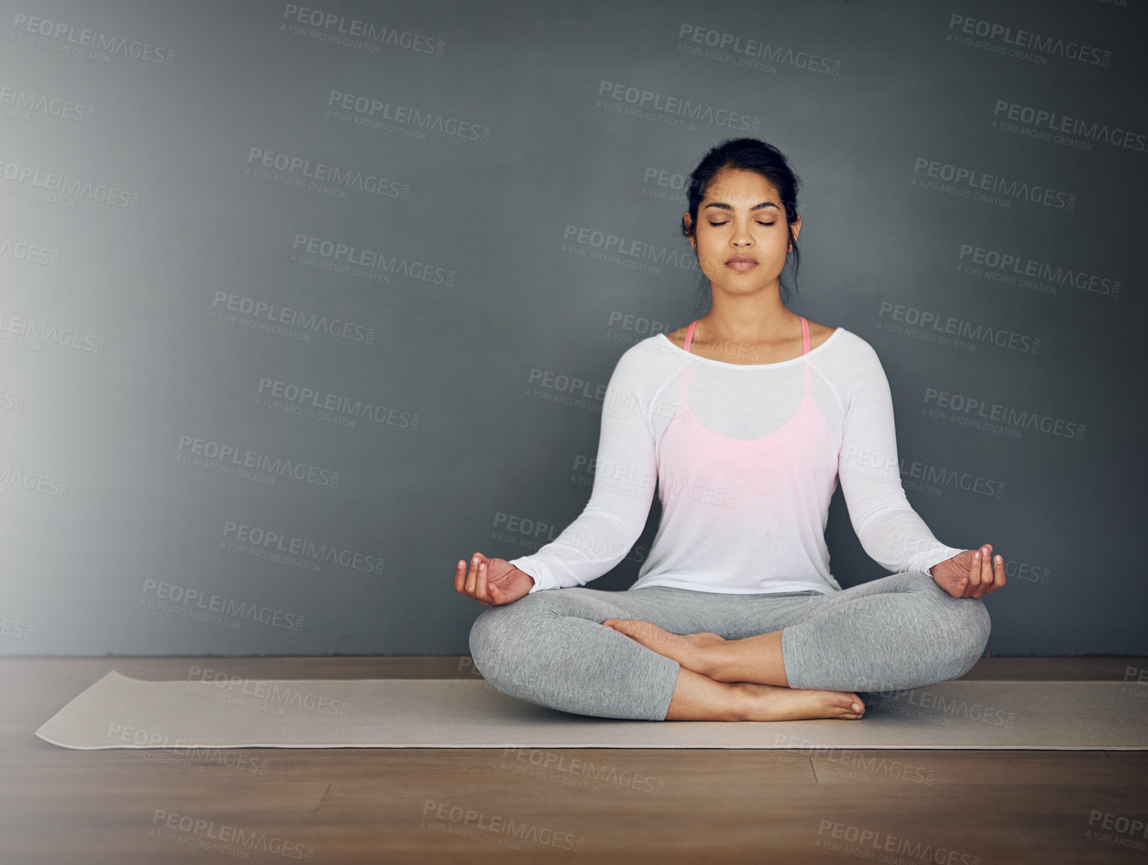 Buy stock photo Meditation, woman and zen on floor for mindfulness, peace or calm on yoga mat in lounge. Relax, spiritual and female person in home for wellness and balance for chakra or holistic for mental health 