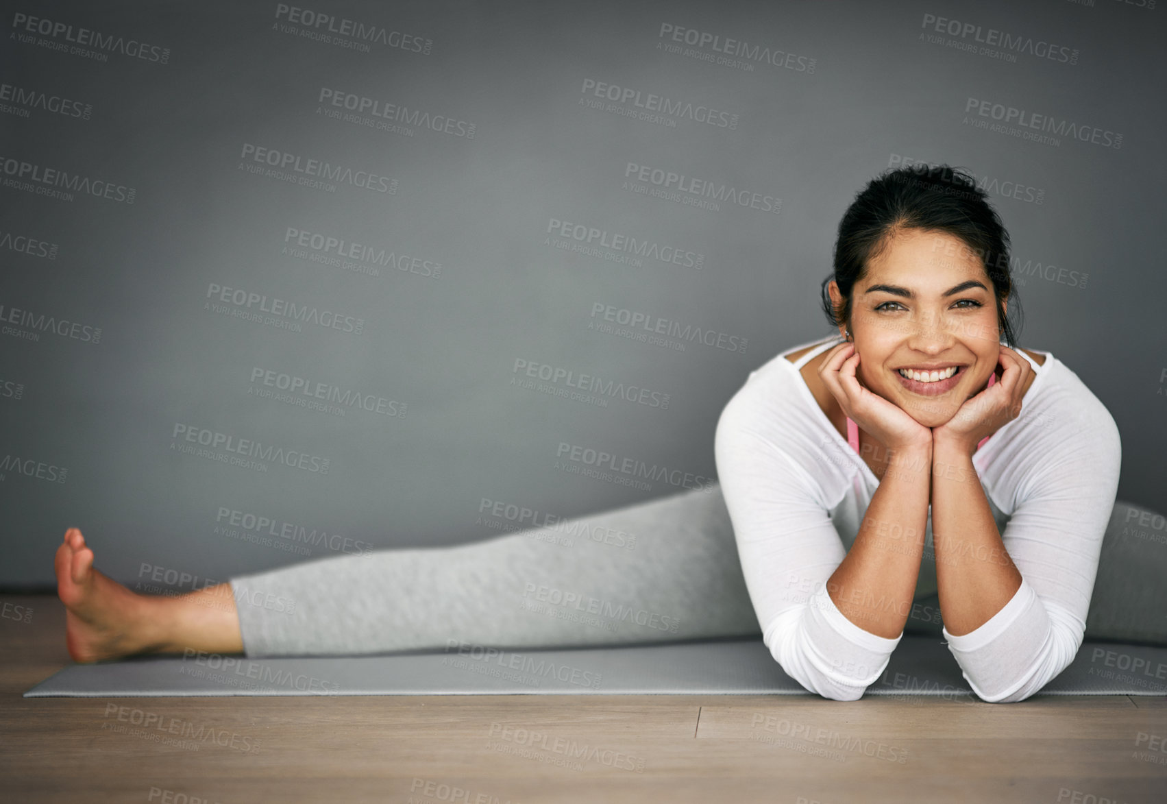 Buy stock photo Woman, fitness and home portrait in splits, pilates and wall background for body wellness with relaxing smile. Happy, flexibility training and stretching legs on mat, contortion and balance activity