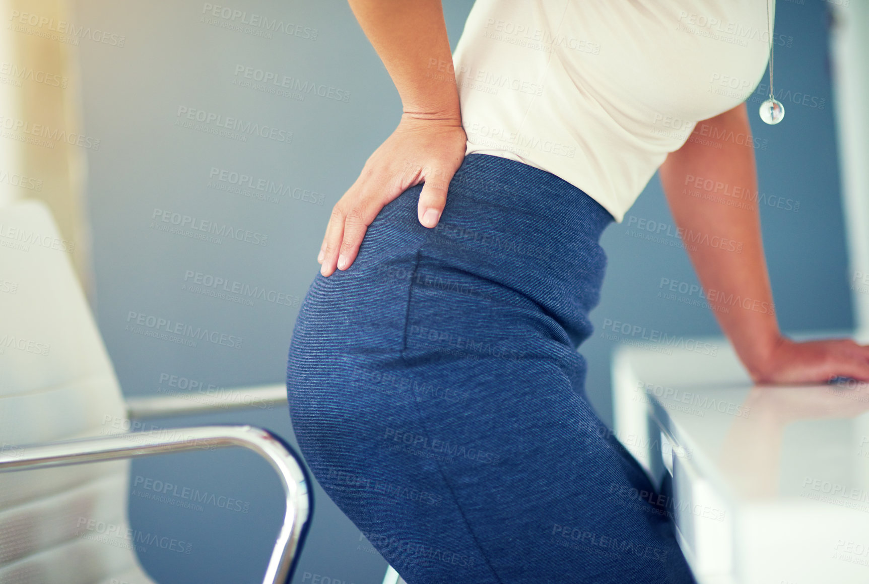 Buy stock photo Woman, back pain and fatigue at desk for corporate company, human resources and tired body. Anatomy or health, problem and professional person with injury, burnout and muscle tension in workplace  