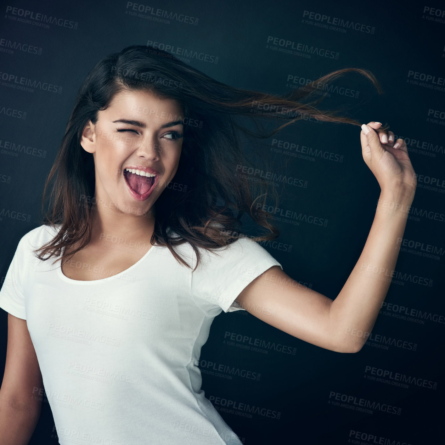 Buy stock photo Happy, woman and excited with hair care in studio for salon treatment, growth and satisfaction. Wink, female person and face with texture for shampoo shine, results or haircut on black background