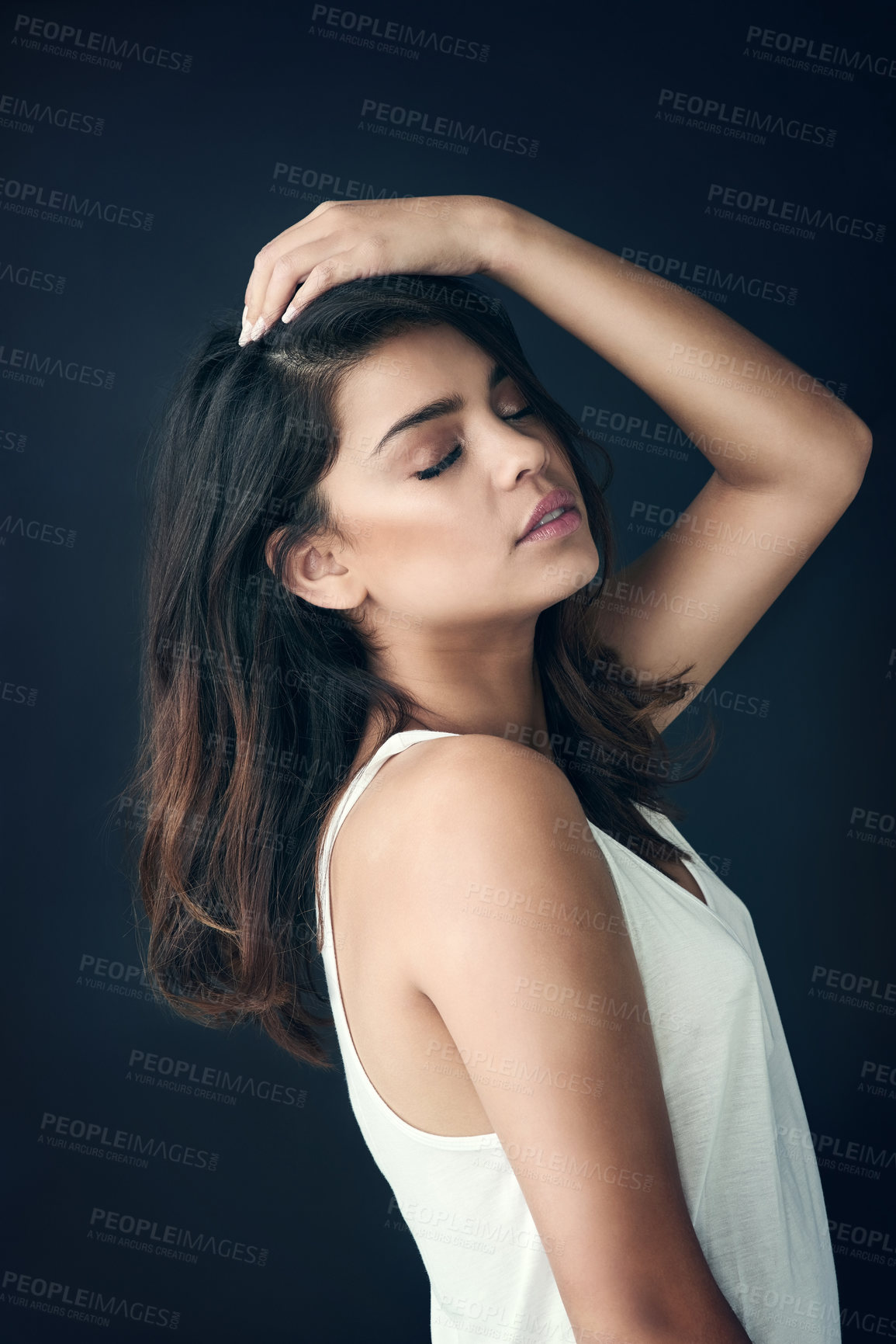 Buy stock photo Confident, woman and thinking with hair care in studio for shampoo treatment, shine and pride. Serious, female person and face with satisfaction for salon results, growth and glow on black background