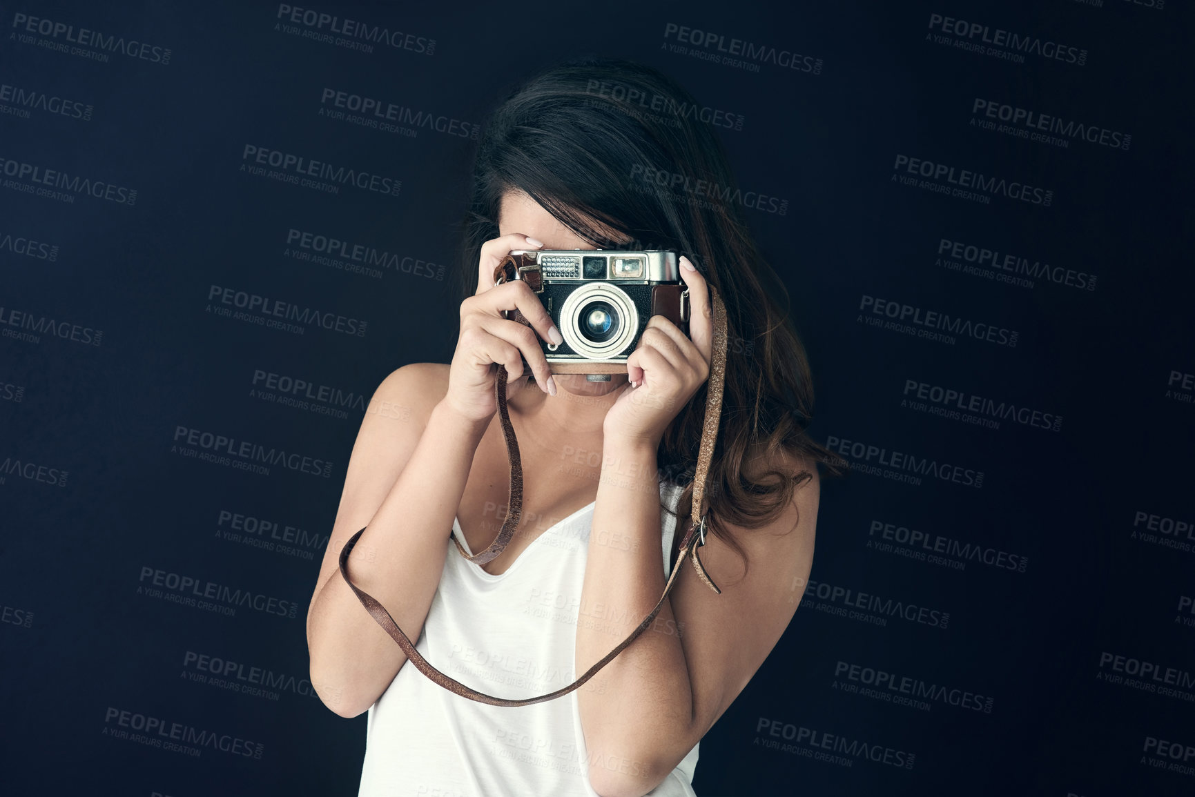 Buy stock photo Photographer, woman and studio for creative person, photography for memories on blue background. Retro, vintage equipment and photo journalist or paparazzi, lens and professional with camera 