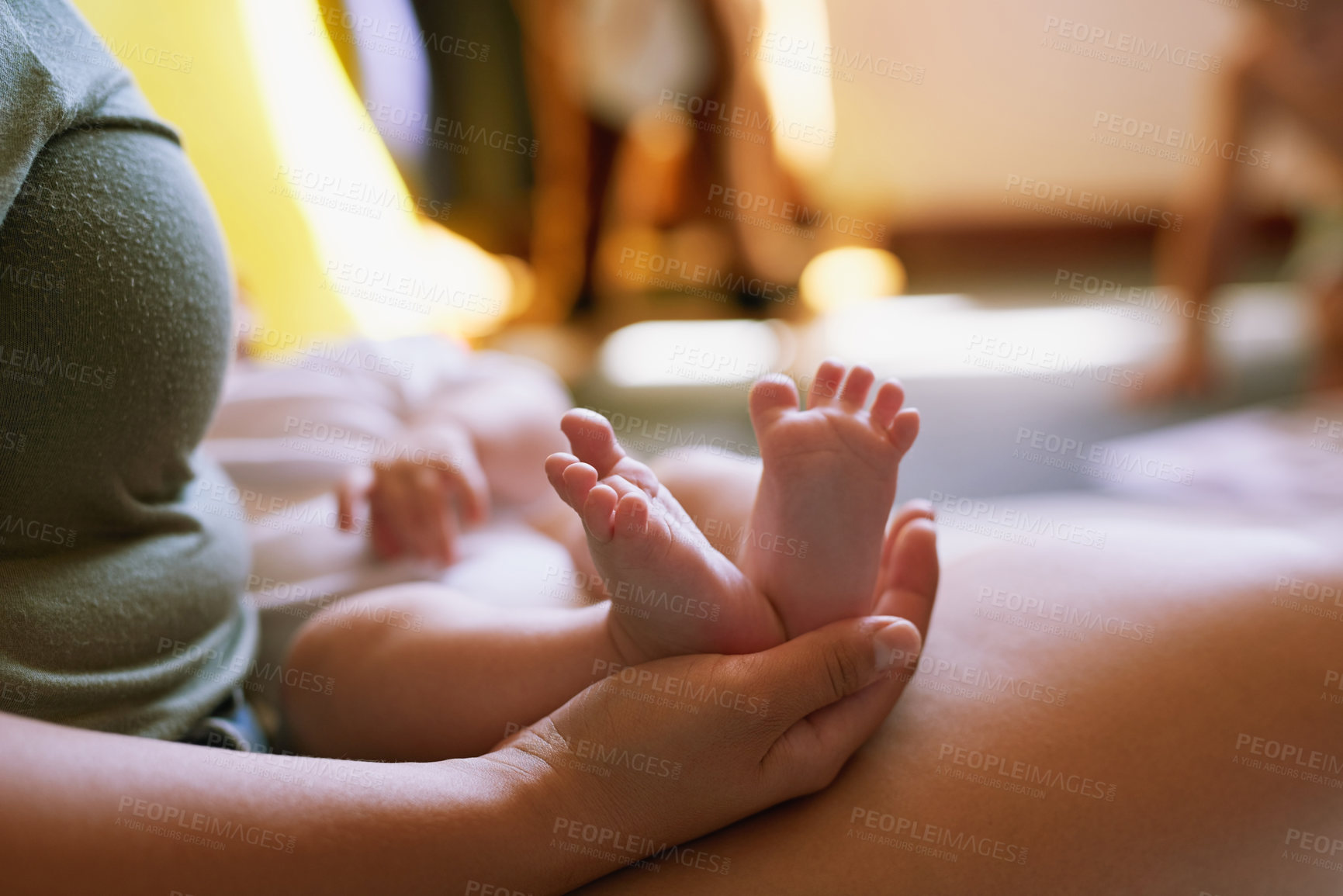 Buy stock photo Woman, newborn and feet in home for bonding with love, resting and relaxing or sleep on mother for relationship care. Support, security and trust with family together, motherhood and parent in house