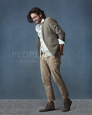 Buy stock photo Full length studio shot of a handsome and stylish young man against a grey background