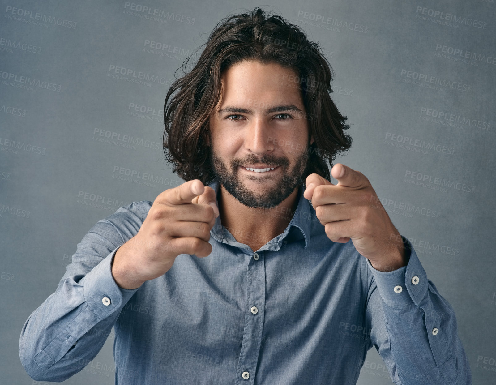 Buy stock photo Finger, point and businessman with portrait in studio for direct communication, promotion and invite for business. Male person, hand gesture and gray background for choice, decision and opportunity.