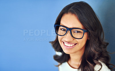 Buy stock photo Woman, portrait and studio optometry with glasses, eye care and vision aid for sight on blue background. Business person, frame and opthalmology product, visual assistance and mock up with spectacles