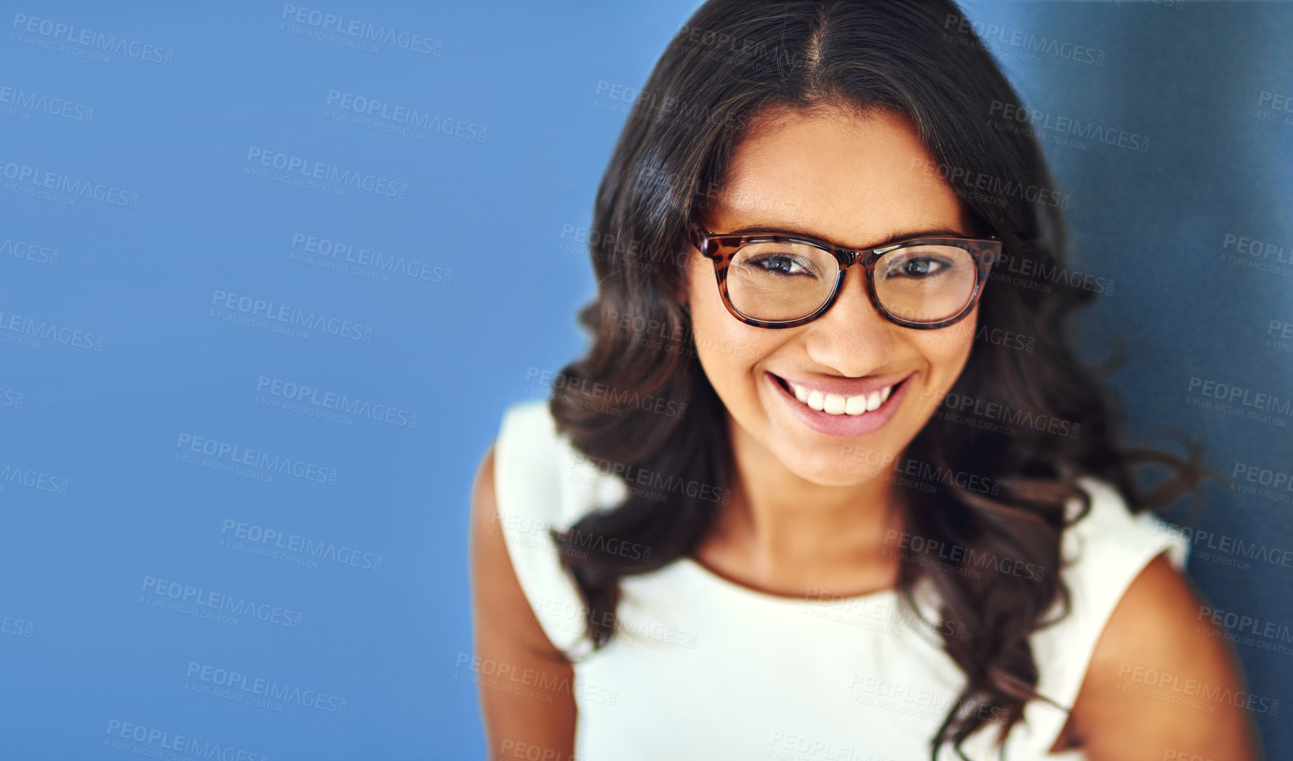 Buy stock photo Portrait, confidence and woman with eyewear in studio for optometry, vision or prescription lens on blue background. Mockup, refraction and business person with spectacles, glasses or top view