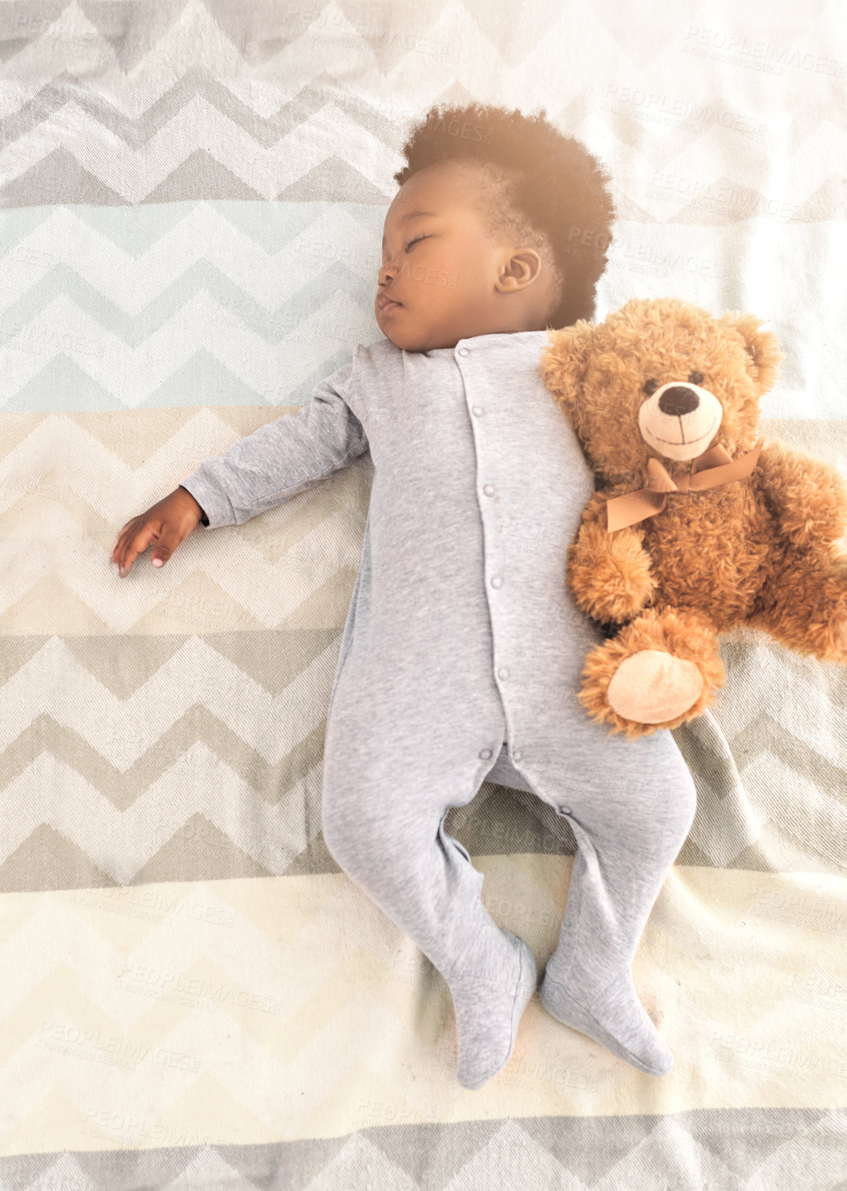 Buy stock photo Top view, bed and baby sleeping with teddy bear for rest, nap time and dreaming in nursery. Childcare, newborn and cute, tired and African child in bedroom sleep for comfort, relax and calm at home