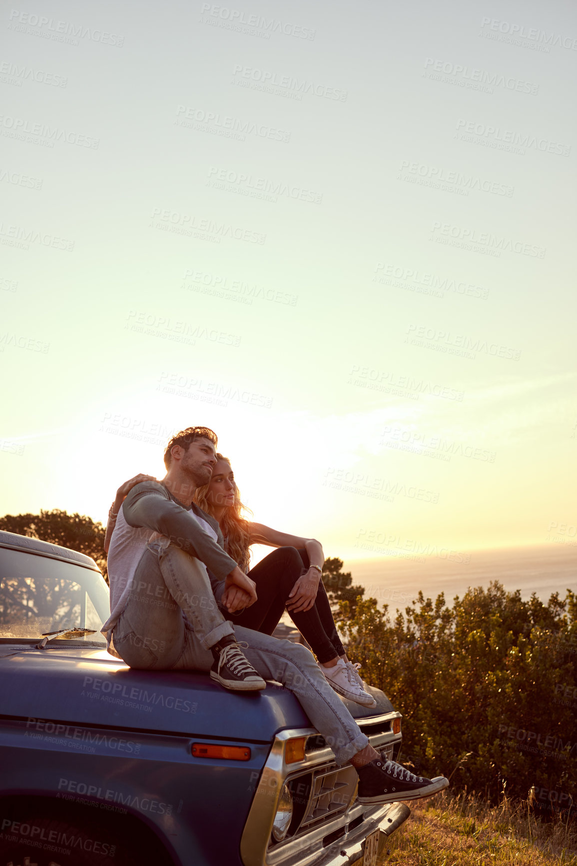 Buy stock photo Travel, couple and relax together on car for road trip break, holiday adventure or romance with sunset. Fun journey, people and view of nature with mockup space, bonding or exploring with connection